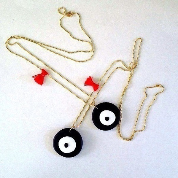 Evil eye and red tassel necklace
