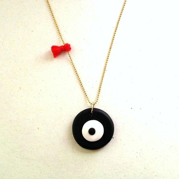 Evil eye and red tassel necklace